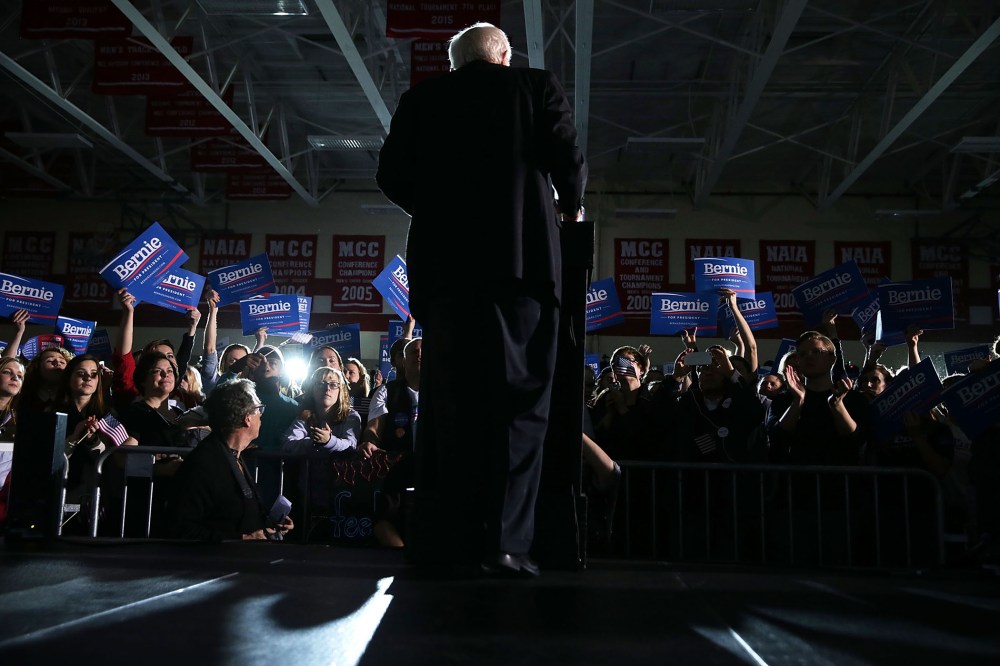 Supporters react as Democratic presidential candidate Sen. Bernie Sanders (I-VT) speaks during a campaign event at Grand View University Jan. 31, 2016 in Des Moines, Iowa. (Photo by Alex Wong/Getty)