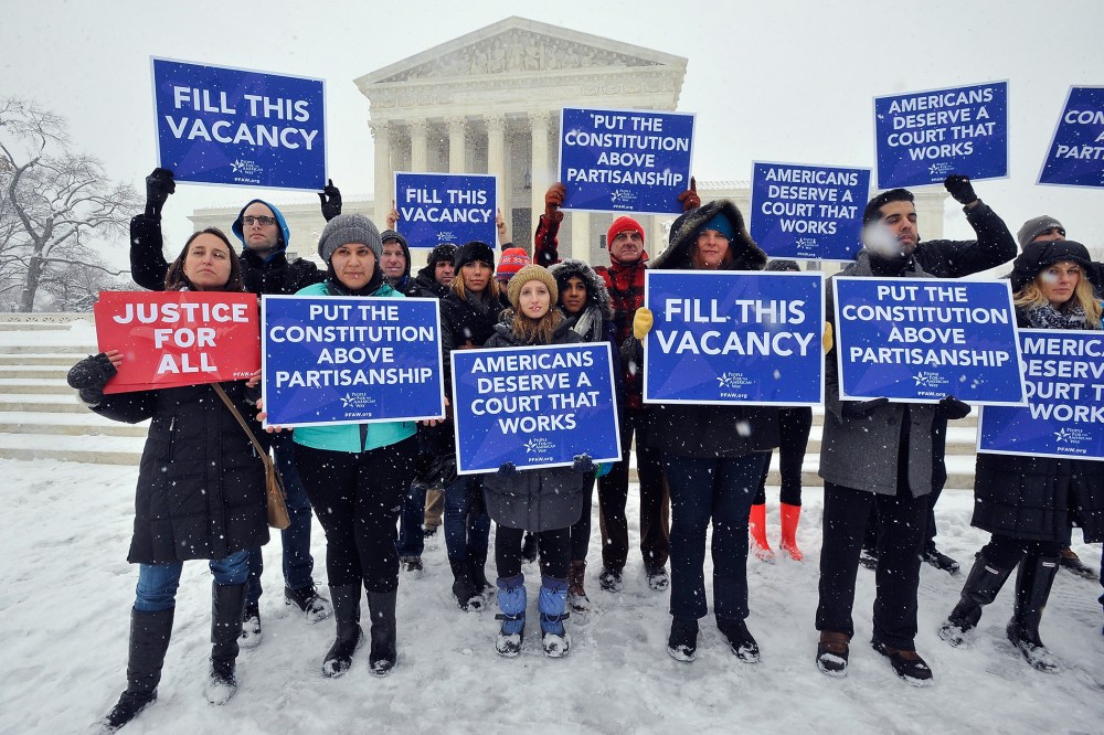 People For the American Way activists rally outside of the Supreme Court on Feb. 15, 2016 in Washington DC. (Photo by Larry French/People for the American Way/Getty)