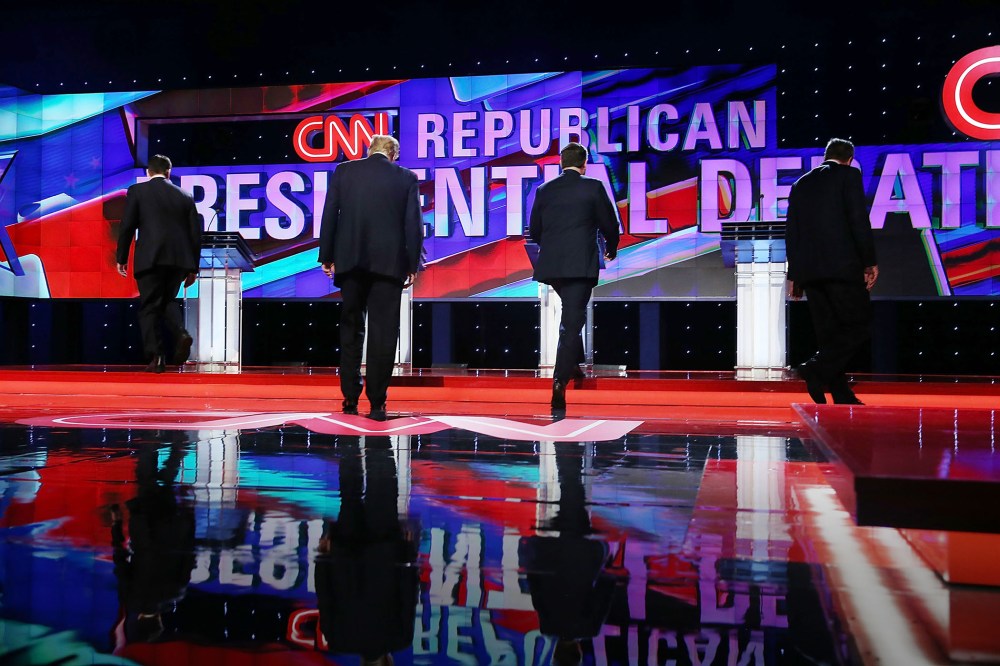 Republican presidential candidates walk to their podiums at the start of the Republican Presidential Primary Debate on the campus of the University of Miami on March 10, 2016 in Coral Gables, Fla. (Photo by Joe Raedle/Getty)