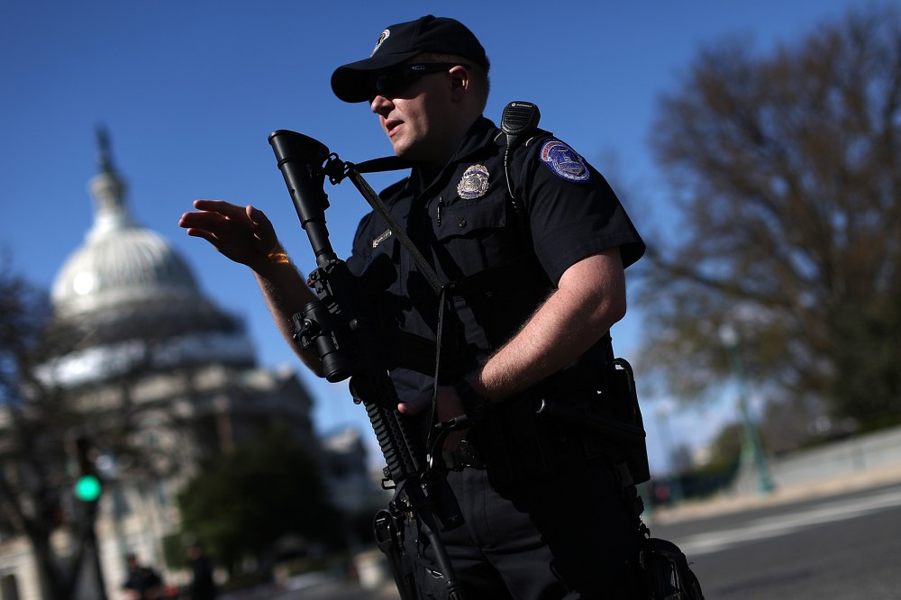 Heavily armed Capitol police stand guard after at least one person was shot in the Capitol Visitor Center March 28, 2016 in Washington, DC. (Photo by Win McNamee/Getty)