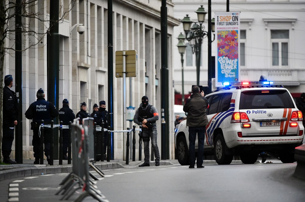 Police block the street outside the council chamber in Brussels, where two terrorism cases will behind closed doors, on March 31, 2016. (Photo by John Thys/AFP/Getty)