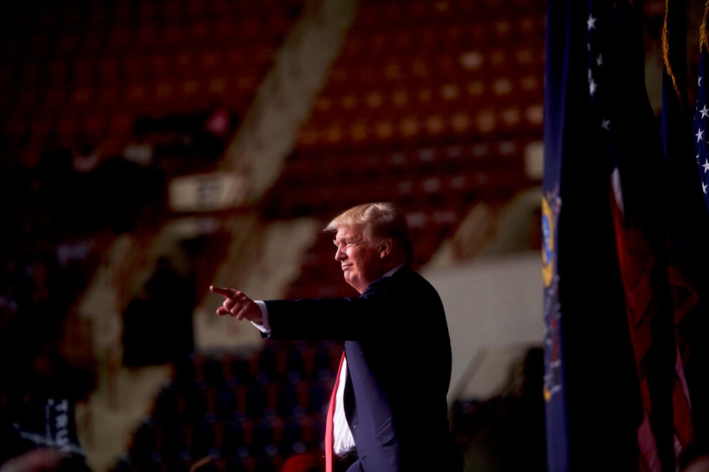 Republican presidential hopeful Donald Trump points to supporters following a rally at the Pennsylvania Farm Show Complex & Expo Center on April 21, 2016 in Harrisburg, Penn. (Photo by Mark Makela/Getty)