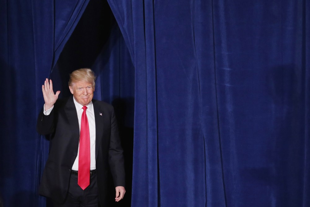 Republican presidential candidate Donald Trump walks out from backstage before delivering a speech about his vision for foreign policy at the Mayflower Hotel on April 27, 2016 in Washington, DC. (Photo by Chip Somodevilla/Getty)