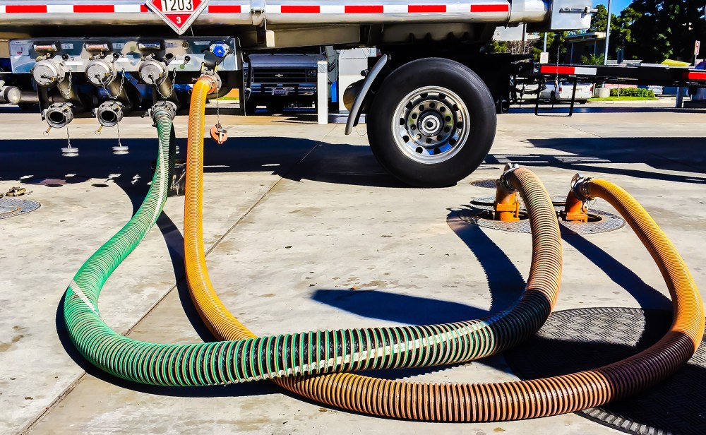 A gasoline tanker distributes gasoline to underground gasoline tanks in Venice, Calif., Jan. 24, 2015. (Photo by Bob Berg/Getty)