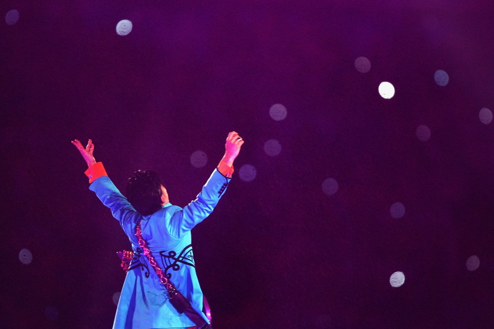 Musician Prince performs during the "Pepsi Halftime Show" at Super Bowl XLI between the Indianapolis Colts and the Chicago Bears on Feb. 4, 2007 at Dolphin Stadium in Miami Gardens, Fla. (Photo by Jed Jacobsohn/Getty)