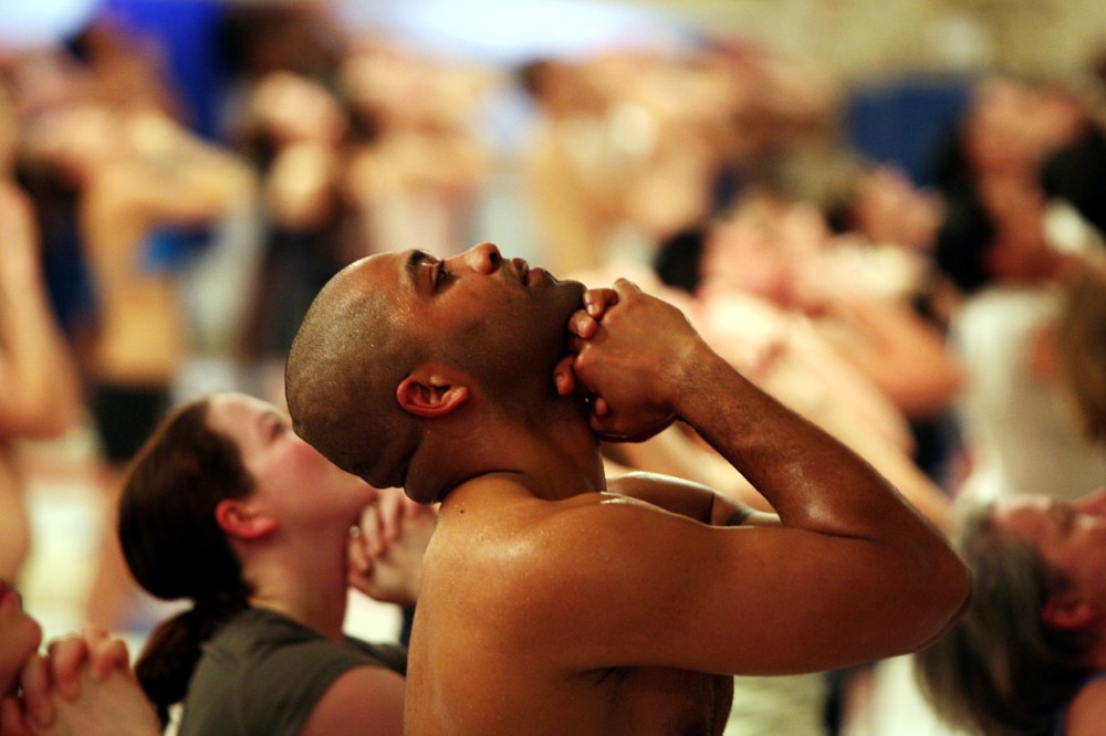 Students practice Bikram Yoga at the City Studio, on March 13, 2007 in London, England. (Photo by Matt Cardy/Getty)