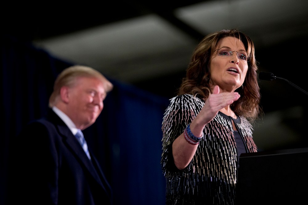 Former Alaska Gov. Sarah Palin, right, endorses Republican presidential candidate Donald Trump during a rally at the Iowa State University, Jan. 19, 2016, in Ames, Iowa. (Photo by Mary Altaffer/AP)