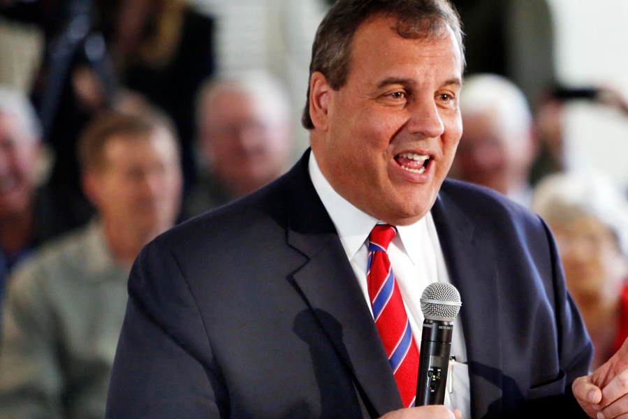 New Jersey Gov. Chris Christie, R-N.J. takes a questions during a town hall meeting with area residents in Londonderry, N.H., on April 15, 2015. (Photo by Jim Cole/AP)