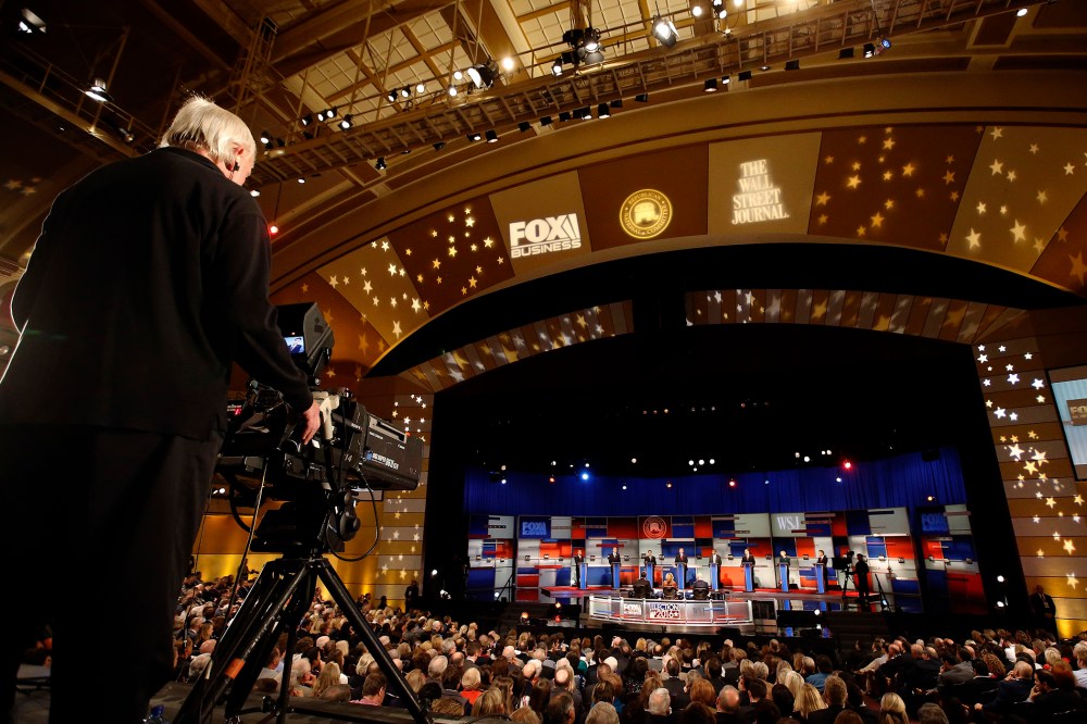 A cameraman films the top Republican presidential candidates during Republican presidential debate at Milwaukee Theatre, Nov. 10, 2015, in Milwaukee, Wis. (Photo by Morry Gash/AP)