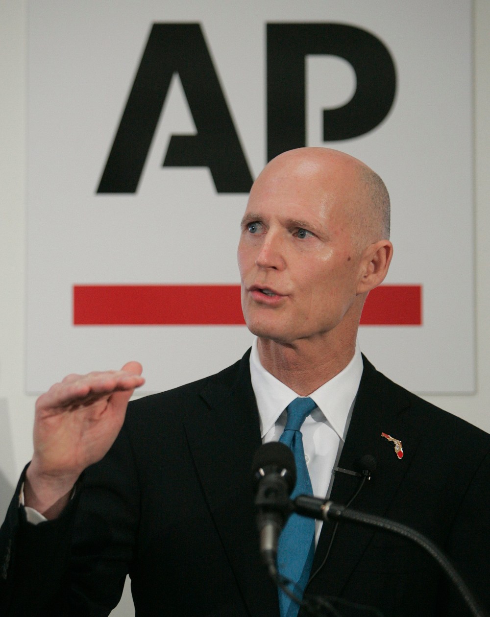 Florida Gov. Rick Scott speaks to the press on Wednesday, Jan. 29, 2014, in Tallahassee, Florida.