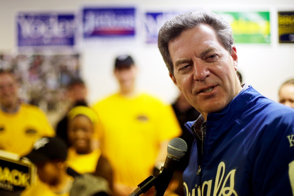 Kansas Republican Gov. Sam Brownback talks to supporters during a campaign event on Nov. 1, 2014, in Topeka, Kan.