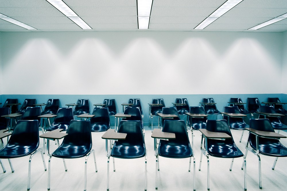 Desks in a classroom. (Photo by Bob O'Connor/Gallery Stock)