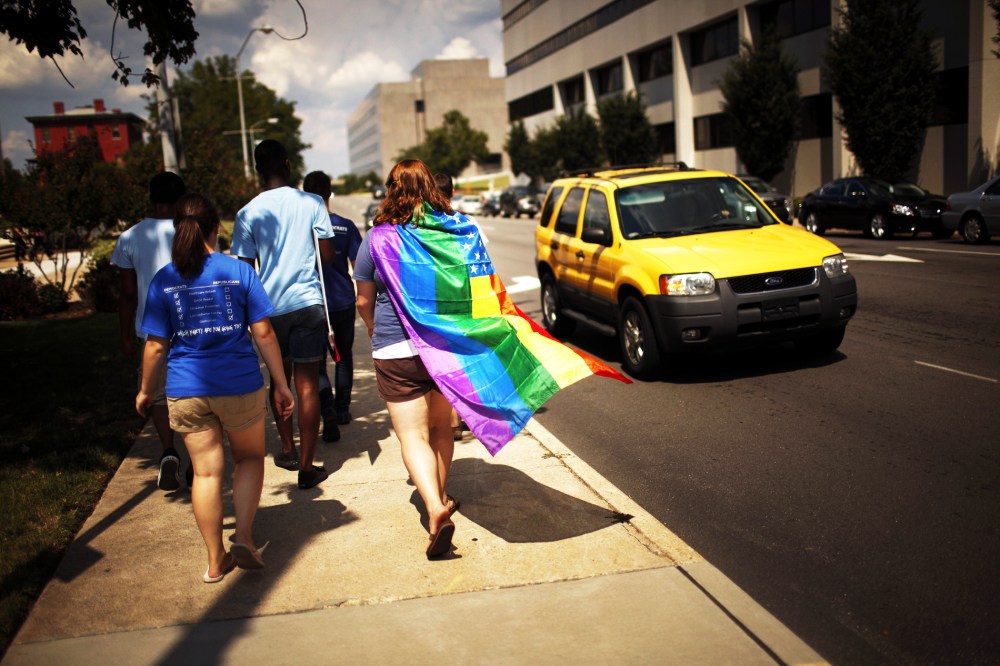 Same-sex marriage supporters leave a protest in Raleigh, N.C.