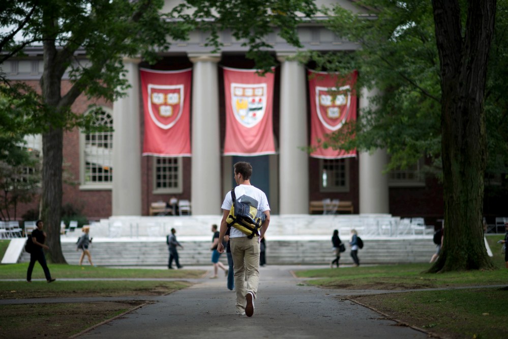 Harvard University students on campus in Cambridge, Mass. on Sept. 10, 2013. (Photo by Gretchen Ertl/The New York Times/Redux)