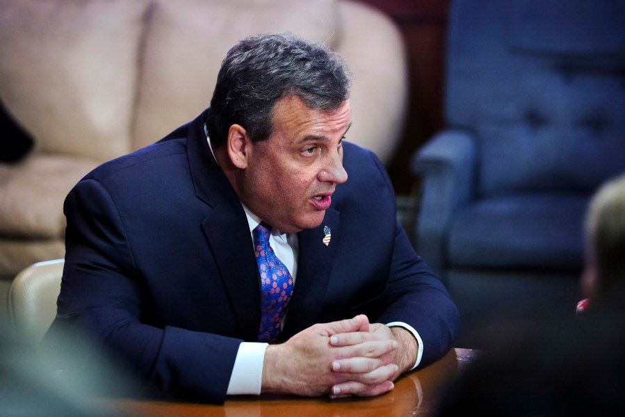 Chris Christie meets with homeowners affected by Hurricane Sandy at the New Point Comfort Fire Company station in Keansburg, N.J., Feb. 4, 2014.