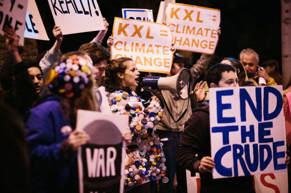 Protestors led by the Natural Resources Defense Council (NRDC) in Santa Monica urge President Obama to reject the Keystone KXL Pipeline, Feb. 3, 2014.