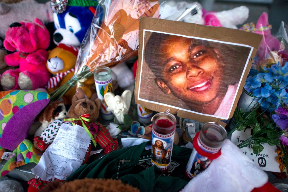 A makeshift memorial on a picnic table for Tamir Rice, the 12-year-old boy carrying a pellet gun who was fatally shot by a Cleveland police officer, in Cleveland, Dec. 4, 2014. (Photo by Ty Wright/The New York Times/Redux)