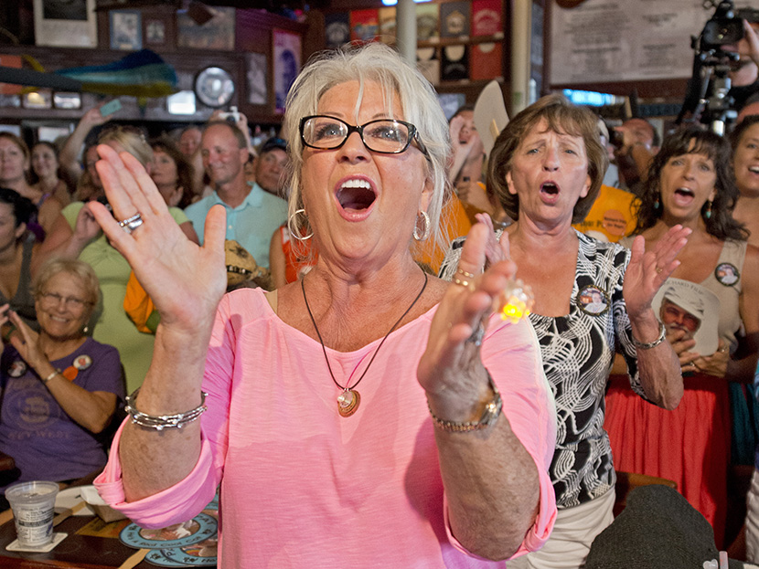 Paula Deen cheers for her husband Michael Groover during the semi-finals of the 'Papa' Hemingway Look-Alike Contest in Key West, Florida, July 21, 2012. (Photo by Andy Newman/Florida Keys News/EPA)