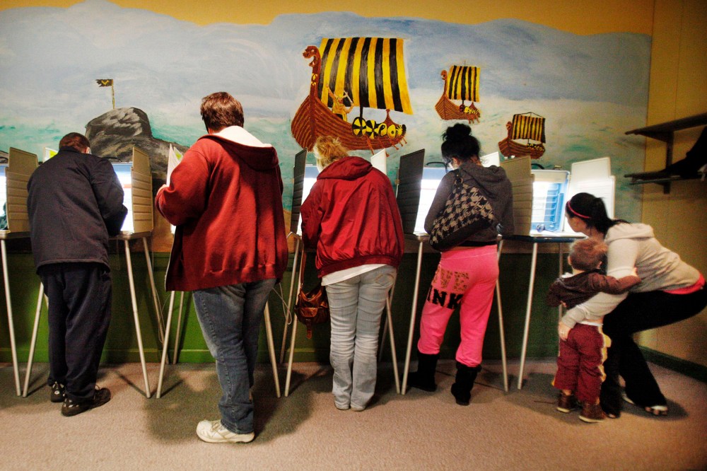 Voters cast their ballots at a polling site in Akron, Ohio, Nov. 6, 2012.