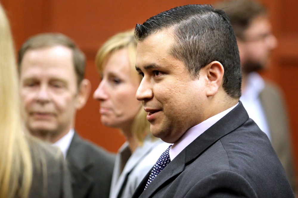 George Zimmerman leaves the courtroom after being found not guilty, on the 25th day of Zimmerman's trial at the Seminole circuit court in Sanford, Florida, July 13, 2013.