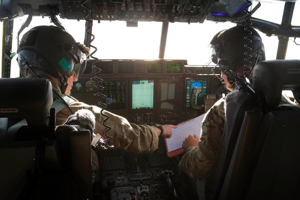 Pilots of an Royal Air Force C-130 Hercules aircraft from RAF Akrotiri, Cyprus, searching for missing EgyptAir flight MS804, at sea in the Mediterranean off the Egyptian coast, May 19, 2016. (Photo by Helen Rimmer/British Ministry of Defence/EPA)