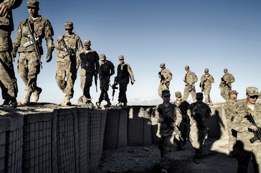 Paratroopers from Bull Battery, 1-319th Field Artillery Battalion pack their duffles for the unit's movement home from Afghanistan on Jan. 25, 2013.