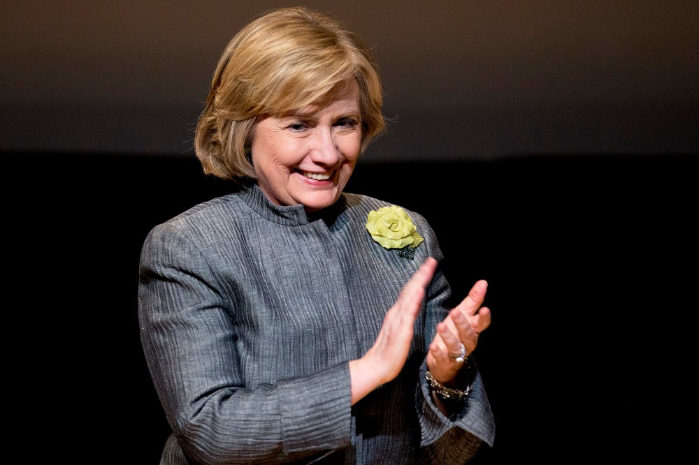 Former Secretary of State Hillary Rodham Clinton smiles following her speech at the Inter-American Development Bank in Washington, May 6, 2014.