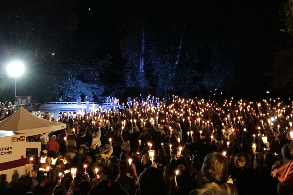 A candlelight vigil is held for the victims of the Umpqua Community College mass shooting in Stewart Park, Umpqua, Ore., Oct. 1, 2015. (Photo by Mike Brunker/NBC News)