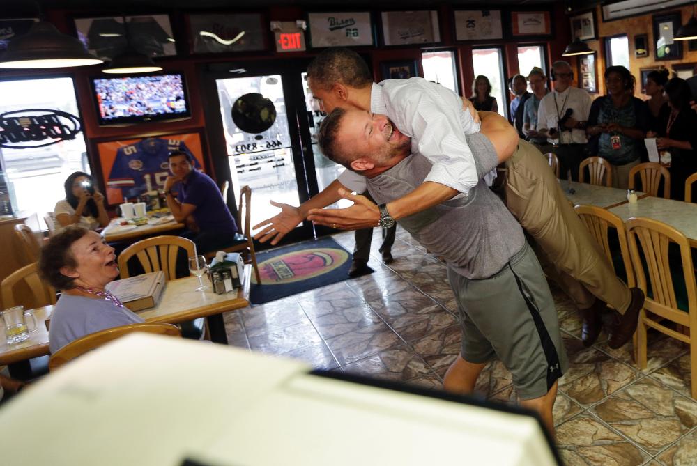Republican small-business owner hugs Obama