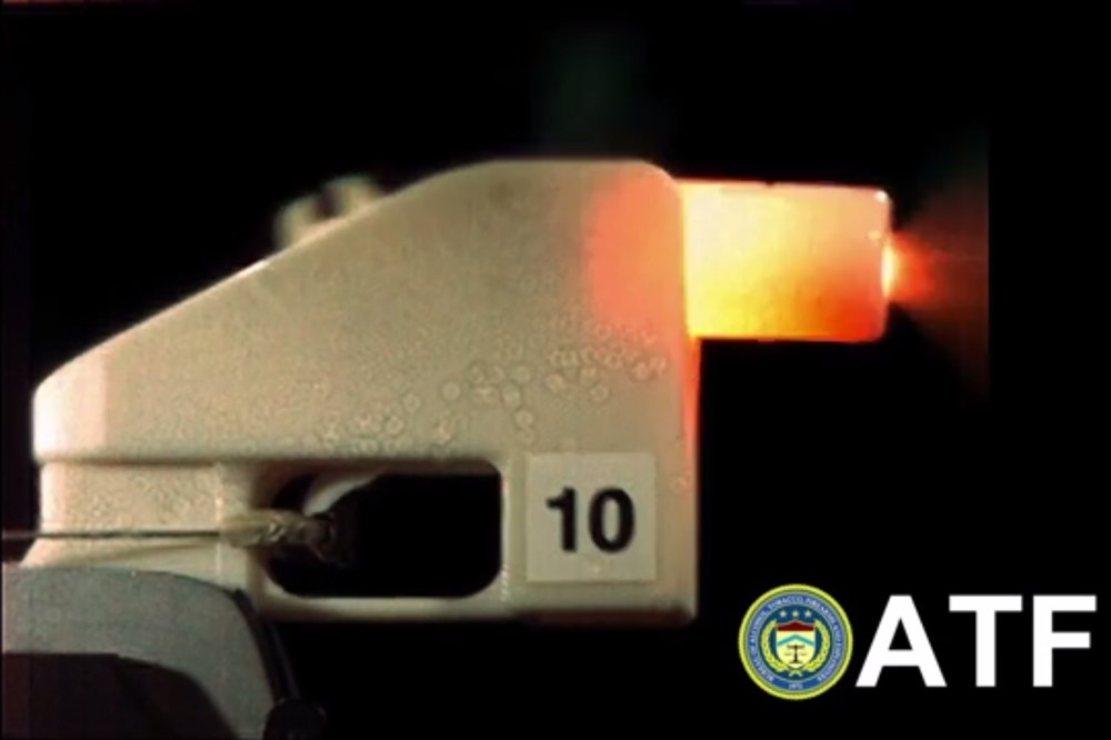 A frame from the U.S. Bureau of Alcohol, Tobacco, and Firearms' YouTube video of their 3D printed plastic gun being fired.