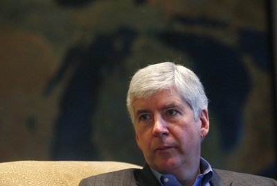 Michigan Gov. Rick Snyder is interviewed in his office in Lansing, Mich., Monday, Dec. 17, 2012. (Photo by Carlos Osorio/AP Photo)