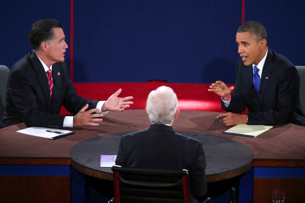 Republican presidential nominee Mitt Romney and President Barack Obama answer a question during the third presidential debate at Lynn University, Monday, Oct. 22, 2012, in Boca Raton, Fla. (AP Photo/Pool-Win McNamee)