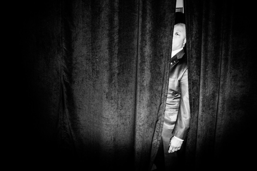 Sen. Tim Scott (R-SC) peaks through the curtain at a rally for Sen. Marco Rubio in Columbia, S.C., Feb. 19, 2016. (Photo by Mark Peterson/Redux for MSNBC)