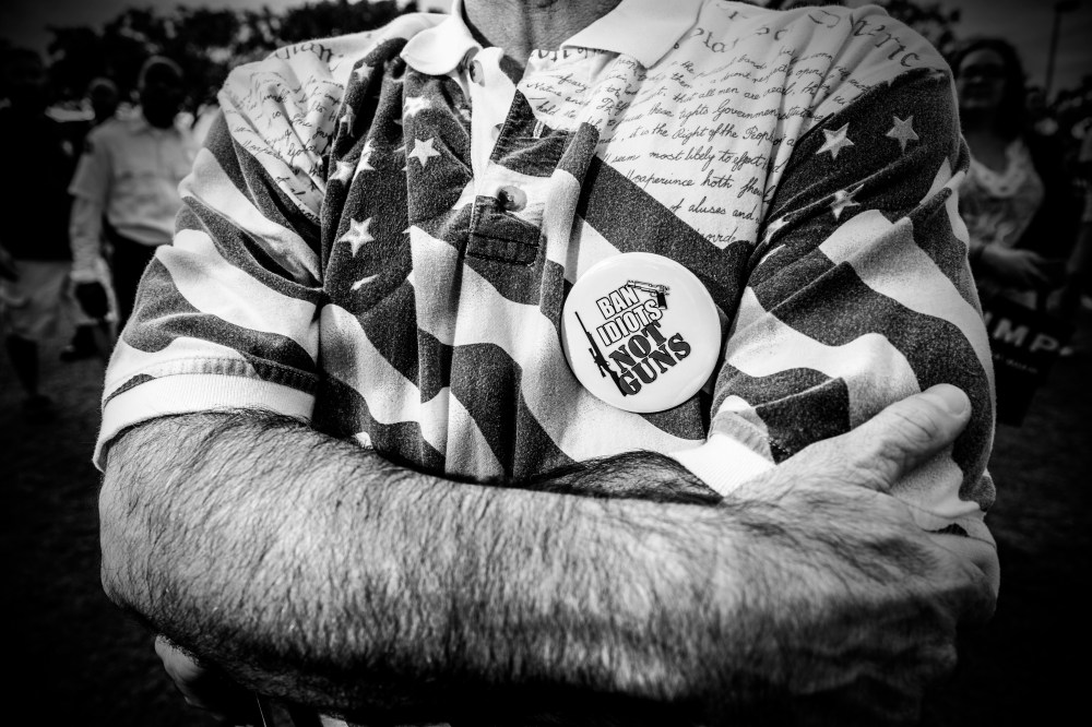 A supporter of Donald Trump wearing a "Ban idiots, not guns" button at a rally in Boca Raton, Fl. (Photo by Mark Peterson/Redux for MSNBC)