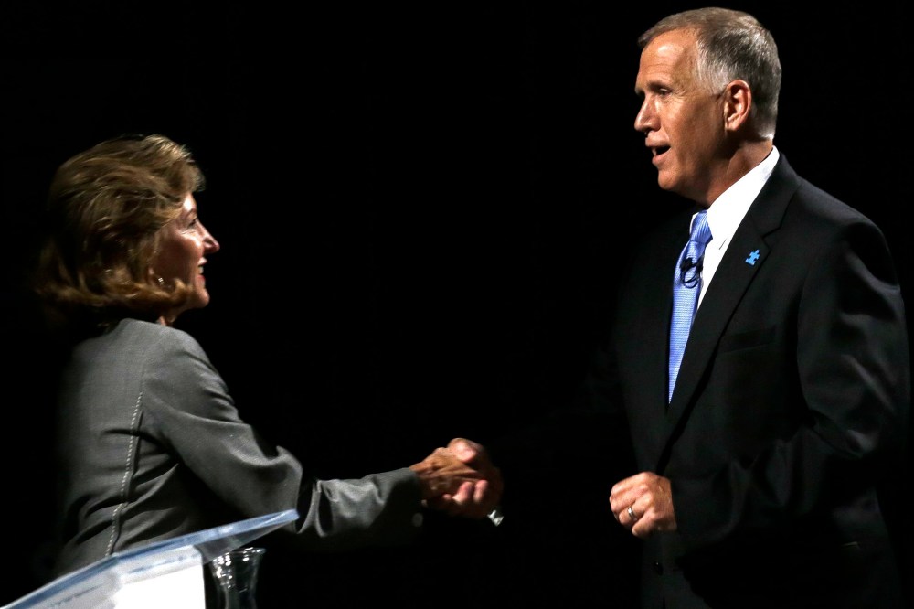 Sen. Kay Hagan, D-N.C., left, and Republican candidate for Senate Thom Tillis shake hands following a televised debate at UNC-TV studios in Research Triangle Park, N.C., on Sept. 3, 2014.