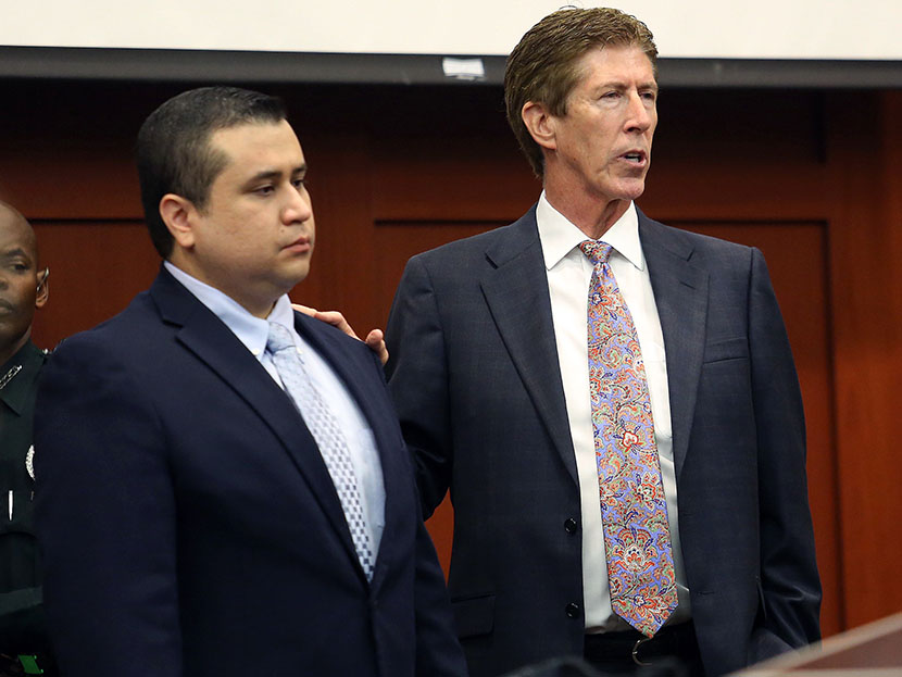 George Zimmerman, left,  stands in the courtroom with defense counsel Mark O'Mara during closing arguments in his trial at the Seminole County Criminal Justice Center, in Sanford, Fla., Friday, July 12, 2013. Photo by Orlando Sentinel/Joe Burbank/Pool/AP
