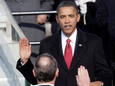 Barack Obama taking the oath of office from Chief Justice John Roberts to become the 44th president of the United States at the U.S. Capitol in Washington on Jan. 20, 2009. (Photo by Jae C. Hong/AP)