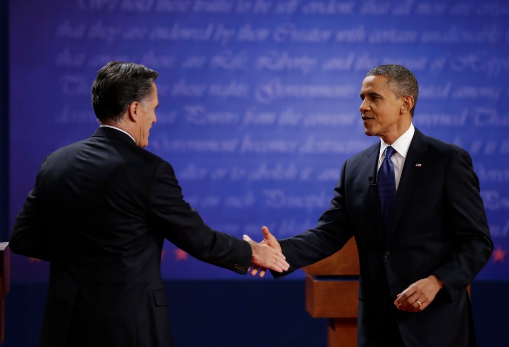 President Barack Obama, right, shakes hands with Republican presidential nominee Mitt Romney after the first presidential debate at the University of Denver, Wednesday, Oct. 3, 2012, in Denver. (AP Photo/David Goldman)