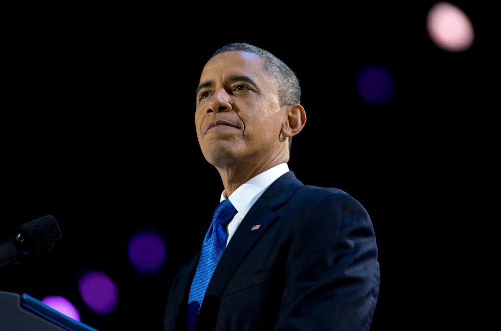 President Barack Obama pauses as he speaks at the election night party at McCormick Place. (AP Photo/Carolyn Kaster)