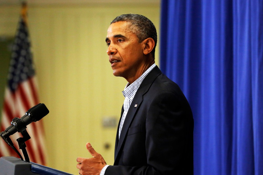 President Barack Obama speaks to reporters, Aug. 14, 2014, about the police shooting of 18-year-old Michael Brown, in Ferguson, Mo.