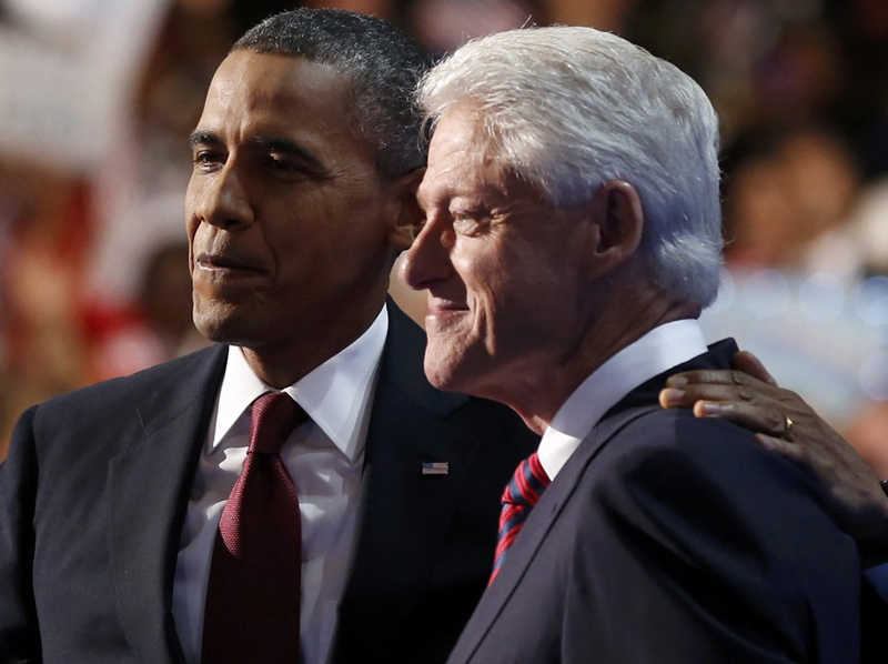 President Barack Obama embraces former President Bill Clinton onstage after Clinton nominated Obama for re-election during the second session of Democratic National Convention in Charlotte, N.C., September 5. (Photo: Reuters/Larry Downing)