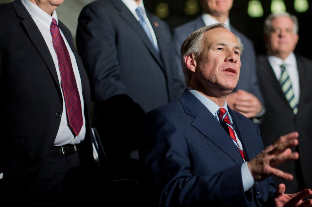 Texas Gov.-elect Greg Abbott speaks to member of the media following a meeting with President Barack Obama and newly elected governors at the White House on Dec. 5, 2014. (Pablo Martinez Monsivais/AP)