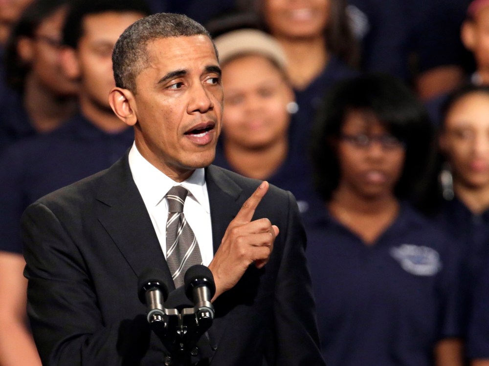 President Barack Obama speaks about strengthening the economy for the middle class and the nations struggle with gun violence at an appearance at Hyde Park Academy, Friday, Feb. 15, 2013, in Chicago. (Photo by M. Spencer Green/AP Photo)