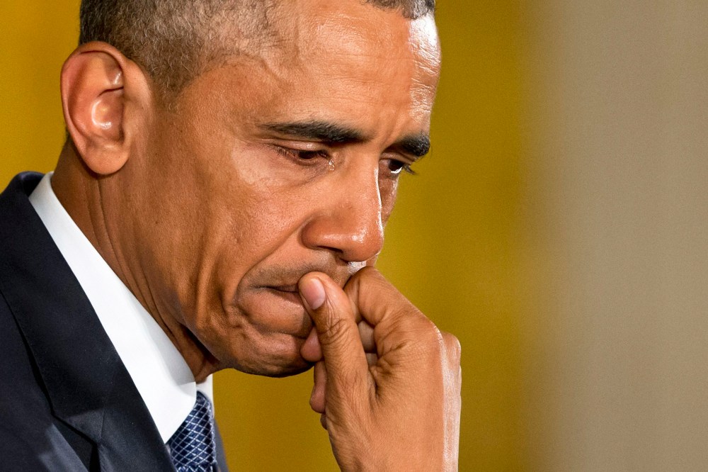 An emotional President Barack Obama pauses as he speaks about the youngest victims of the Sandy Hook shootings, Jan. 5, 2016, in the East Room of the White House in Washington, D.C. (Photo by Jacquelyn Martin/AP)