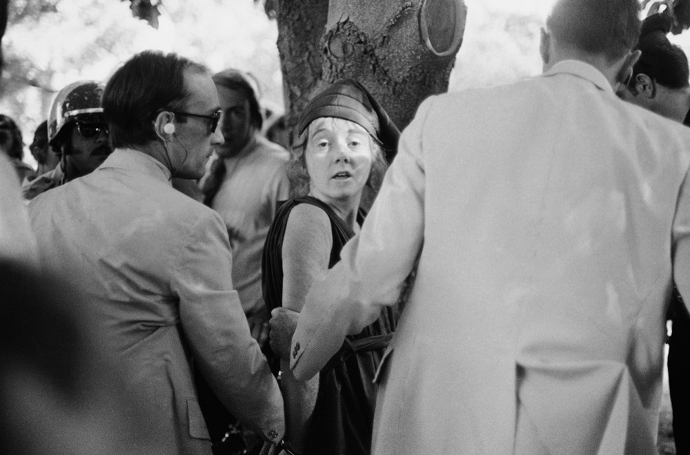 In this Sept. 5, 1975 file photo, U.S. Secret Service agents put handcuffs on Lynette "Squeaky" Fromme after she pointed at President Gerald Ford, in Sacramento, Calif.