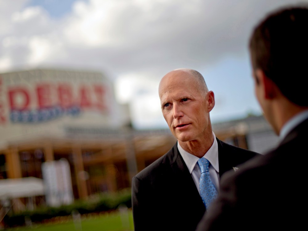 File Photo: Florida Gov. Rick Scott, (Photo by David Goldman/AP)