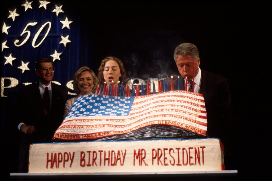 President Bill Clinton blows out candles Aug. 19, 1996 in New York, N.Y. (Photo by Dirck Halstead/Liaison/Getty)