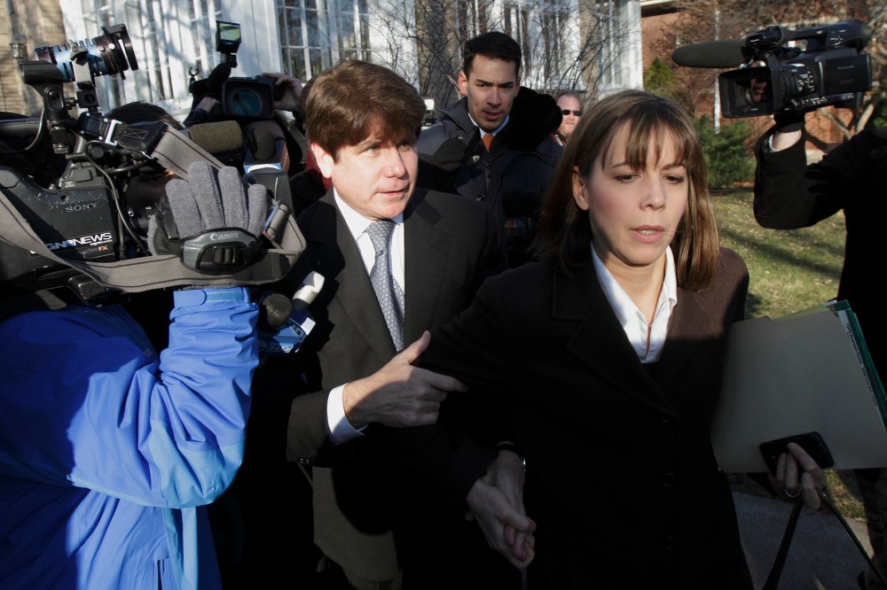 Disgraced former Illinois Gov. Rod Blagojevich and his wife Patti leave their Chicago home for the second day of his sentencing hearing, Dec. 7, 2011. (Photo by John Gress/Reuters)
