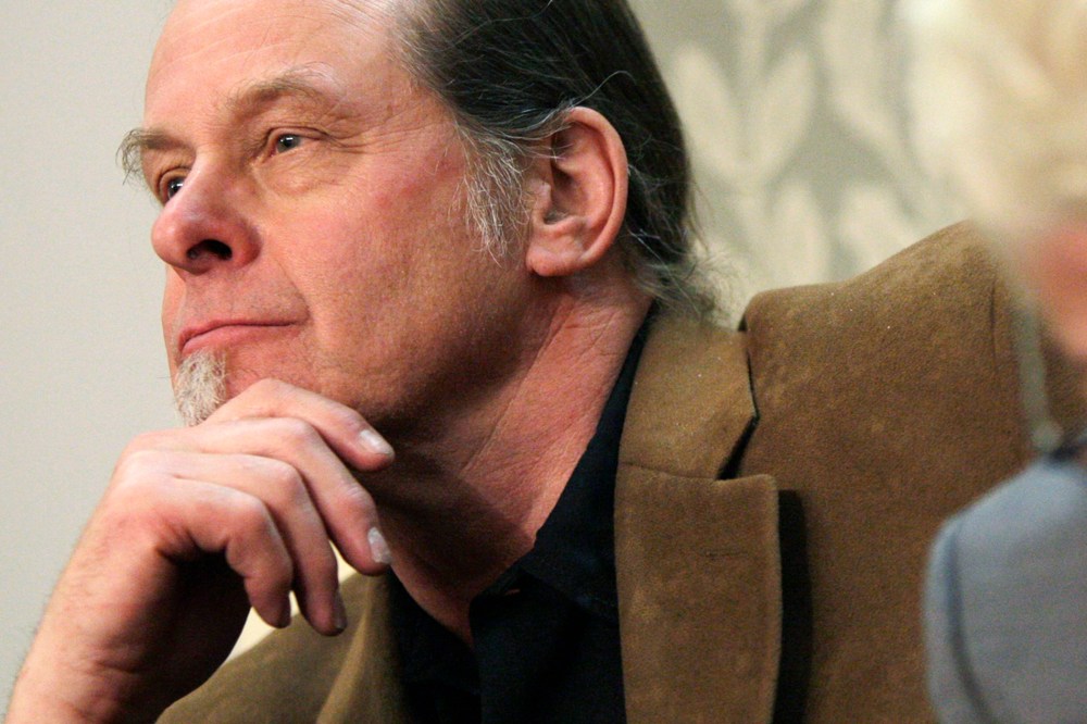 Musician Ted Nugent (L) listens to U.S. President Barack Obama's State of the Union Speech on Capitol Hill in Washington, Feb. 12, 2013.
