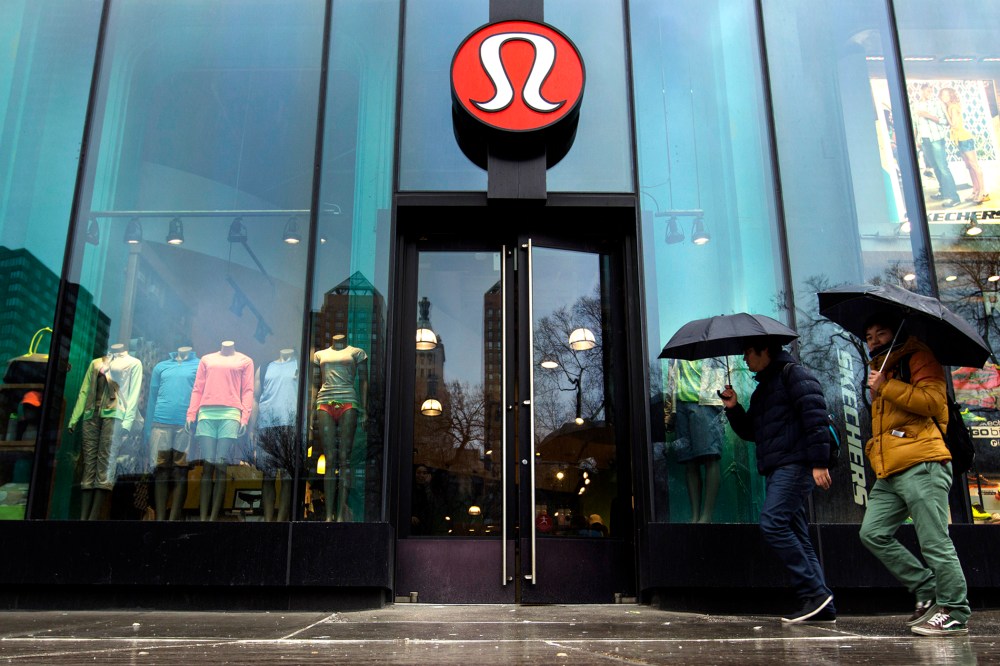Pedestrians walk past a Lululemon Athletica store, March 19, 2013 in New York, N.Y.